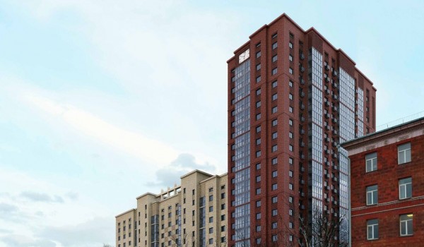 В Марфино постоят жилой дом с часами на фасаде